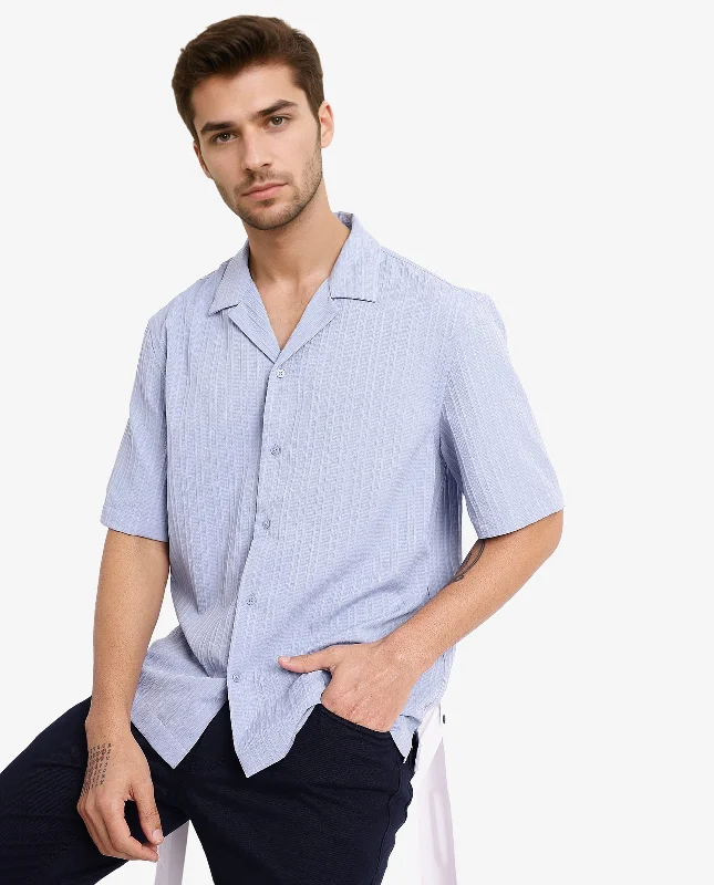 Men's Polo Shirts for Sports and Casual WearRare Rabbit Men's Mirtilo Light Blue Polyester Fabric Short Sleeve Cuban Collar Self Stripe Textured Shirt Men's Polo Shirts for Sports and Casual WearRare Rabbit Men's Mirtilo Light Blue Polyester Fabric Short Sleeve Cuban Collar Self Stripe Textured Shirt